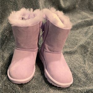 Beautiful toddler Ugg boots size 10 brand new. box is damaged